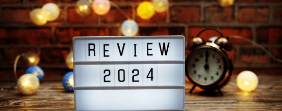 Sign saying Review 2024